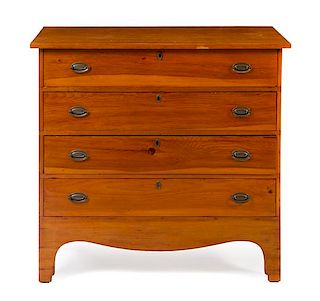 An American Cherry Chest of Drawers Height 37 1/2 x width 39 x depth 17 5/8 inches.