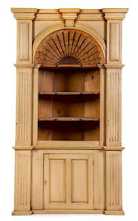 An American Painted Corner Cabinet Height 90 1/2 x width 50 x depth 19 inches.