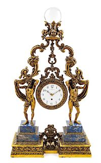 An American Gilt Metal and Lapis Lazuli Figural Mantel Clock Height 29 x width 17 3/4 x depth 7 inches.