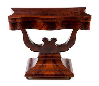 An American Empire Mahogany Games Table Height 28 1/2 x width 35 x depth 17 1/2 inches.
