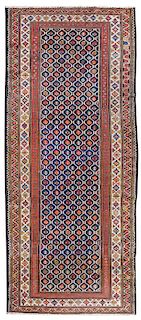 A Bakhtiari Wool Runner 9 feet 7 inches x 3 feet 9 1/2 inches.