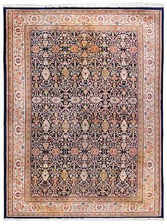 A Persian Wool Rug 11 feet 10 inches x 8 feet 11 inches.