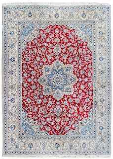 A Nain Wool and Silk Rug, Habibian 12 feet 11 inches x 9 feet 8 inches.