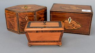 Three tea boxes, one with conch shell inlay, one diamond shaped inlay. 
height 4 1/4 in., 4 3/4 in., & 3 1/4 in.
