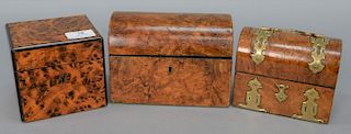 Three piece lot to include two burlwood tea boxes along with a burlwood perfume box with two silver topped perfumes. 
heights 4 1/4 ...