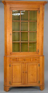 Maple and tiger maple two part corner cupboard. 
height 88 in., width 42 in., depth 24 in.