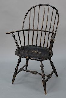 Windsor sack back armchair set on bold turned legs. 
seat height 18 1/4 in., total height 41 in.