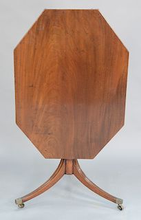 George III mahogany top table on plain turned shaft set on tripod base. 
height 29 in., top: 27" x 38"