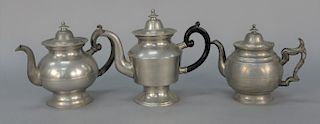 Three pewter teapots, G. Richardson, Cranston, R.I., #'s C + 4. 
height 7 in., 8 in., & 9 in.