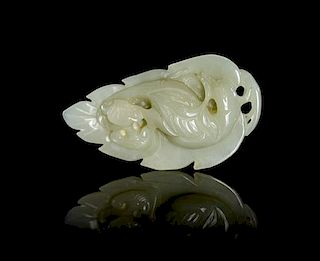 A Carved Jade Pendant Height 3 inches.