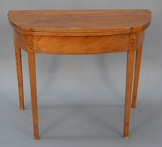 Federal mahogany shaped game table with line inlays, circa 1800. 
height 29 in., width 35 1/4 in., depth 16 1/2 in.