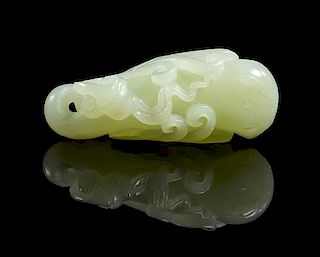 A Carved Jade Toggle Width 2 3/4 inches.