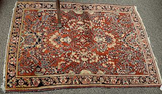 Sarouk Oriental throw rug (end fraying). 
3'3" x 4'10"