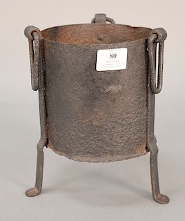 Colonial iron cooking stand with three rings on three legs. 
height 9 1/2 in., diameter 6 3/8 in.