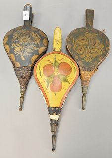 Three early painted and stenciled bellows. 
length 17 in., 16 1/2 in., & 18 in.
