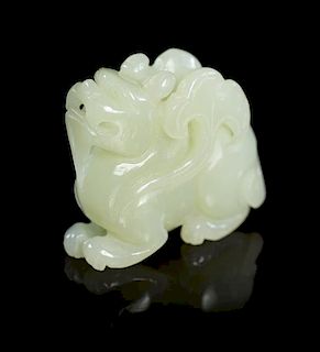 A Jade Figural Toggle Height 1 5/8 inches.