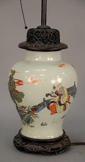 Chinese porcelain vase having enameled scholar in courtyard with flying bat having carved hardwood cover and base, made into a table...