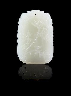 A Carved Jade Pendant Height 2 1/8 x width 1 3/8 inches.