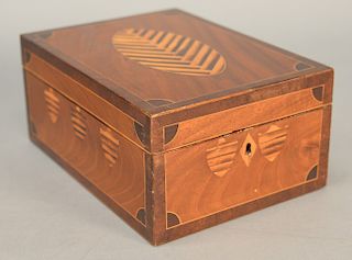 Wood travel box with shield shaped inlays, interior with mirror and compartments. 
height 4 1/4 in., top: 6 3/4" x 9"
