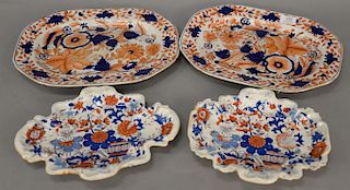 Four piece lot to include two blue and orange platters, two are shaped, 19th century.  platters: 11 1/4" x 14 1/4" & 9" x 12"