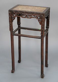 Chinese 19th century hardwood stand with marble top over carved sides. 
height 31 1/2 in., top: 16" x 11"
