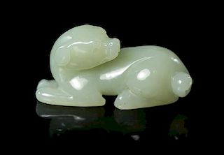 A Carved Jade Toggle Length 2 inches.