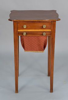 Federal mahogany work table with shaped top over drawer and bag drawer set on square tapered legs, circa 1800. 
height 29 1/2 in., t...