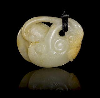 * A Carved Jade Pendant Length 2 inches.