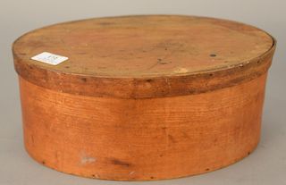 Oval four finger box with cover. 
height 5 5/8 in., top: 9 1/2" x 13 1/2"