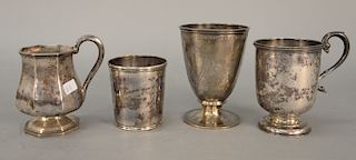 Four various N. Harding Boston coin silver cups, two with handles. 
height 3 1/4 in. to 5 in., 
21 total troy ounces
