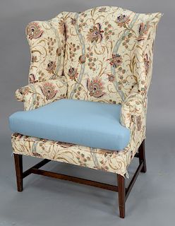 Federal mahogany upholstered wing chair with line inlay and stretcher base, circa 1800. 
height 45 3/4 in., width 35 in.
