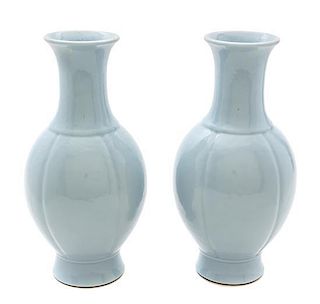 * A Pair of Clair-de-Lune Porcelain Vases Height 10 inches.