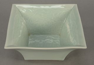 Celadon glazed square bowl, interior with incised fish design. 
height 3 3/4 in., width 7 in.