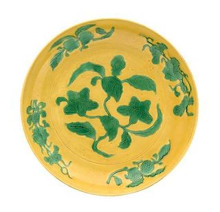 A Yellow and Green Glazed Porcelain Dish Diameter 11 7/8 inches.