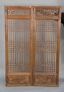 Pair of Chinese pierced wall panels. 
height 65 3/4 in., width 21 1/2 in., each