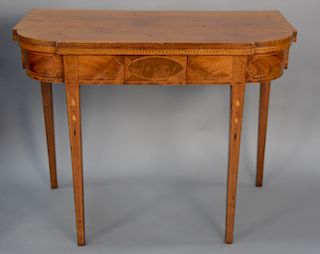 Federal mahogany D shaped game table with bellflower line and panel inlays, all set on square tapered legs, circa 1800. 
height 29 i...