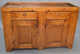 Primitive dry sink having two drawers over two doors. 
height 32 1/4 in., 48 3/4 in.