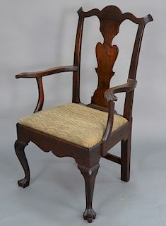 Queen Anne walnut armchair with carved splat, slip seat on cabriole legs ending in trifed feet, circa 1760. 
seat height 17 1/2 in.,...