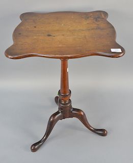 Candlestand with shaped top on urn turned shaft. height 27 in., top: 18 1/4" x 19"
