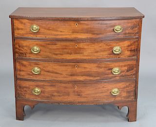 Chippendale mahogany bowed front four drawer chest with line inlay on cut out bracket feet, circa 1780. 
height 35 in., width 39 3/4...