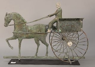 Copper weathervane, horse drawn wagon with rider having zinc head and feet. 
height 19 1/2 in., length 26 1/2 in.