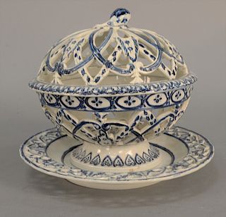 Soft paste covered chestnut baset with underplate, blue highlighted and reticulated, circa 1830.  basket: height ht 8 in.,  unde...