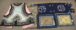 Five Chinese silk embroidered pieces to include silk vest with butterflies and flowers, blue silk cloth with embroidered cranes, and...