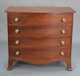Federal cherry and mahogany bowed front four drawer chest on French feet, circa 1800. 
height 38 1/2 in., case width 40 in.