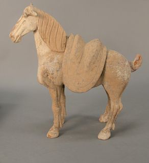 Tang horse with removable saddle, being sold with Oxford Thermoluminescence Analysis report dated March 2000, circa 220-581 AD (chip...