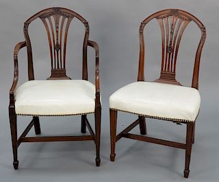 Set of twelve mahogany George III dining chairs with leather seats including two armchair and ten side chairs, circa 1800.