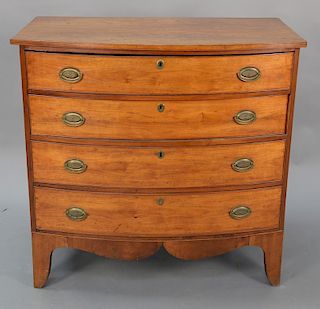 Federal bowed front four drawer chest on French feet, circa 1800. 
height 38 in., case width 37 1/4 in.