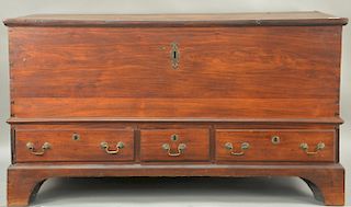 Walnut Chippendale blanket chest with lift top over three short drawers, set on bracket feet, Pennsylvania circa 1780. 
height 27 1/...