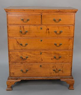 Chippendale maple tall chest having two over four drawers on ogee bracket feet. 
height 47 in., width 36 3/4 in.