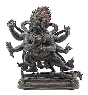 * A Sino-Tibetan Bronze Figure of Vajrapani Height 7 x 5 1/2 inches.